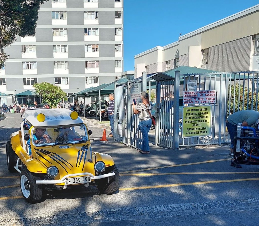 Chris taking a senior resident for a drive in his beach buggy at The Wild Buggers Beach Buggy Club charity event.