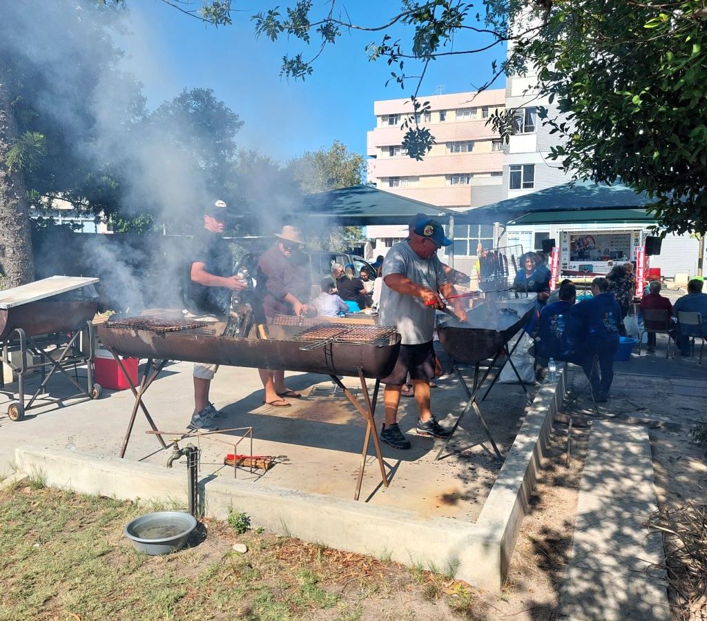 Members of The Wild Buggers Beach Buggy Club braaing for the residents of Huis Uitsig during their charity event.