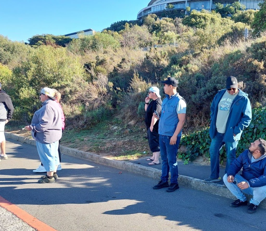 Wild Buggers Beach Buggy Club members enjoying a social chat and "kuierspot" on Lovers Lane during the Huis Uitsig Charity Run.