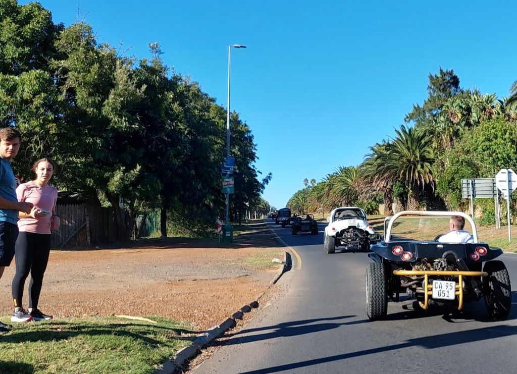 Convoy of Wild Buggers Beach Buggies and old school VW air-cooled vehicles driving to the Huis Uitsig Charity event in the Western Cape.