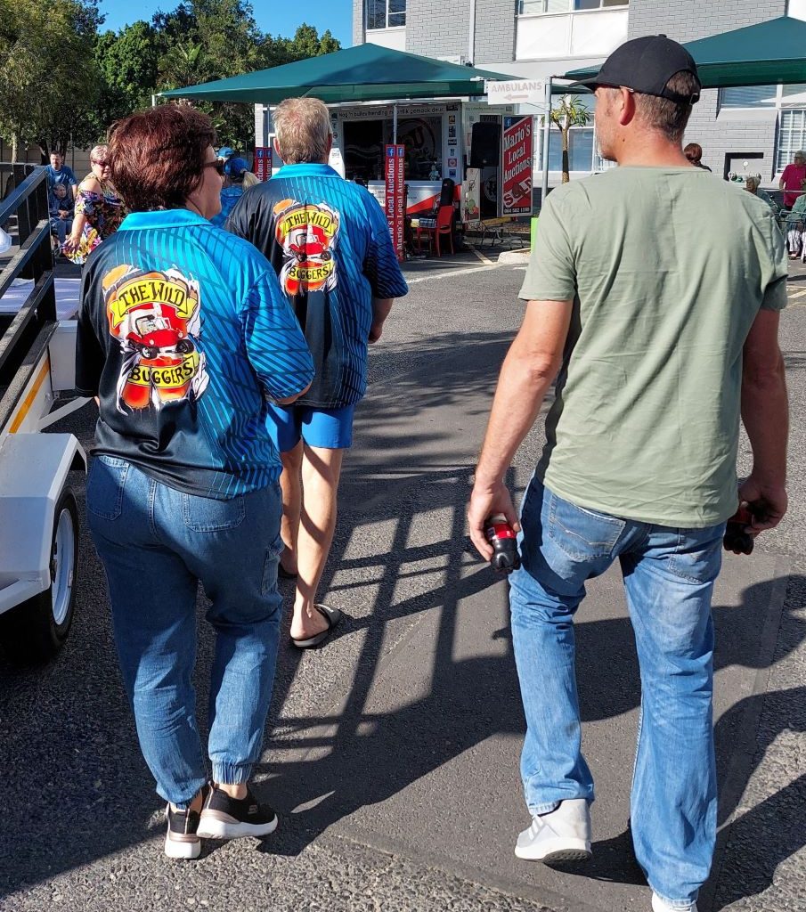 Wild Buggers Beach Buggy Club members relaxing and enjoying the sunny charity event at Huis Uitsig with their classic VW vehicles.