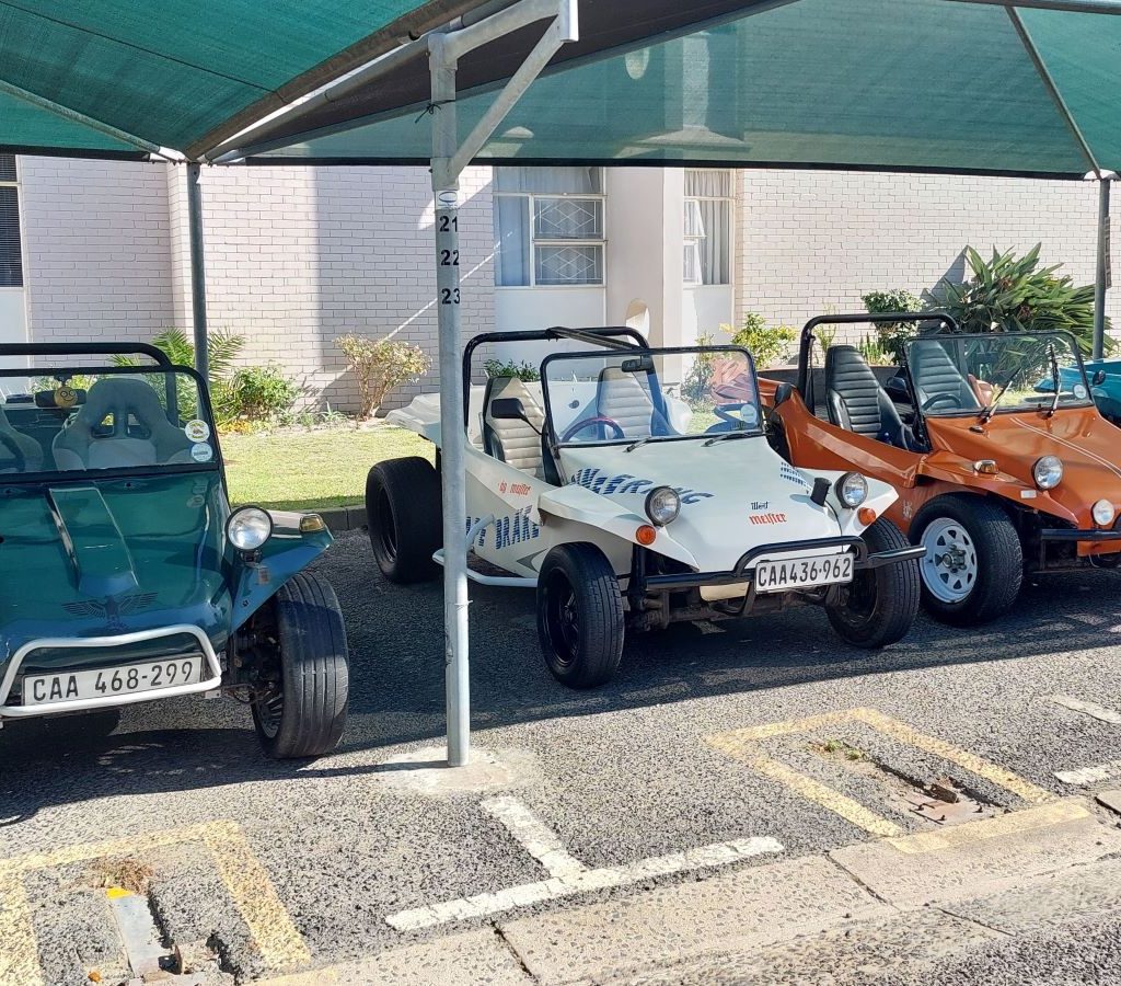 A classic white Beamish Beach Buggy with a VW air-cooled engine parked during a Wild Buggers club run.