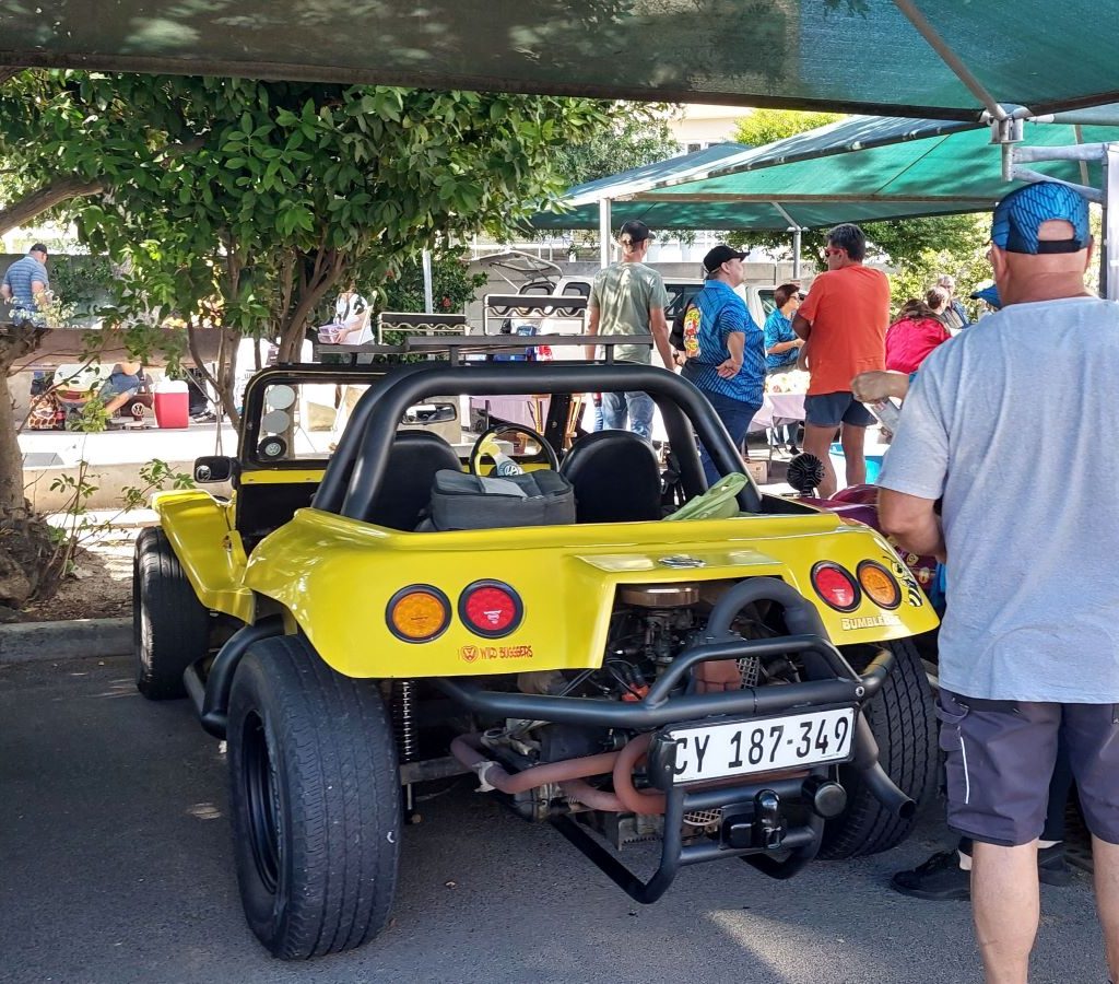 Anthony’s bright yellow Salamander beach buggy with a classic VW air-cooled engine at a Wild Buggers Beach Buggy Club event.