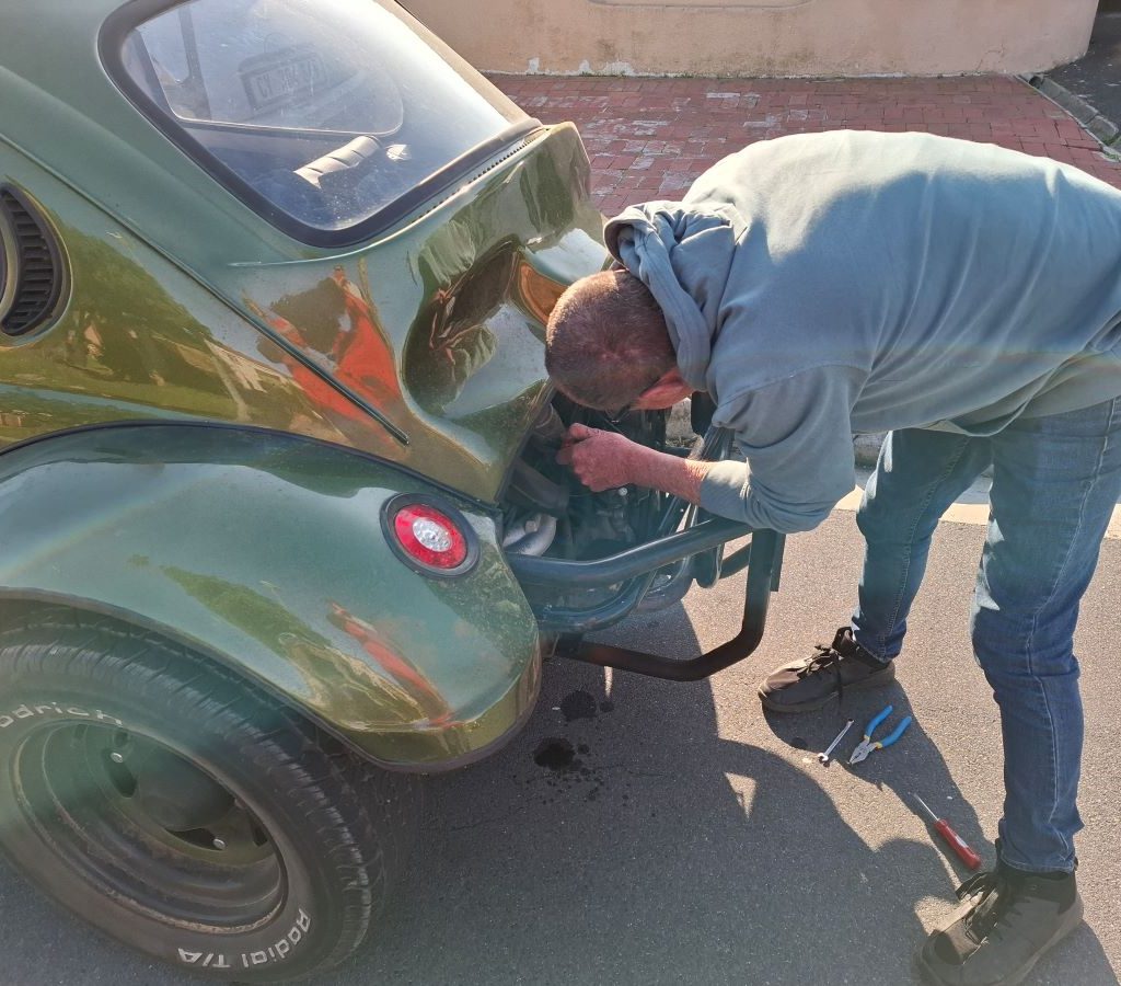 Mickey’s green Baja Bug at Jessie’s house for a carburetor adjustment after an awesome run.