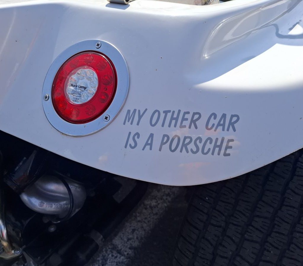 A sticker on a Wild Buggers beach buggy that reads "My other car is a Porsche," which is true for this member.