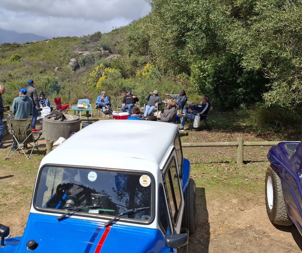 Jessie Huggett's beach buggy in the foreground with Wild Buggers members braaing in the background.