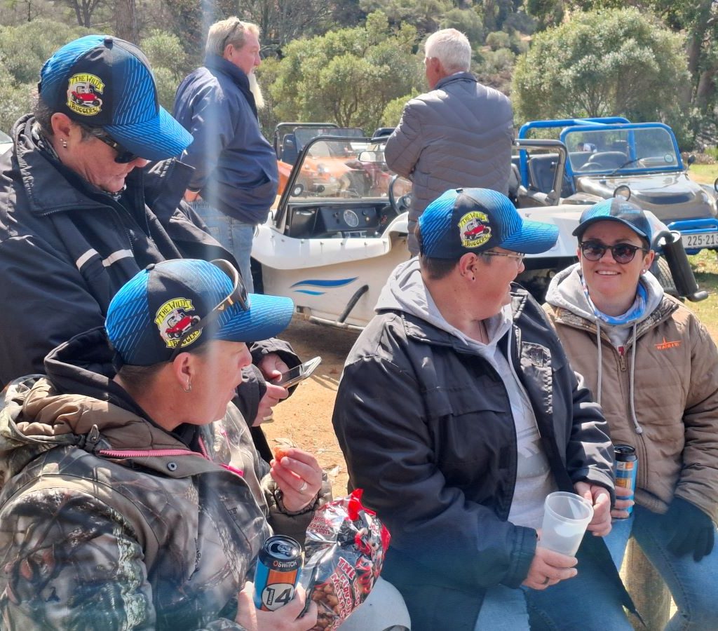Wild Buggers Beach Buggy Club members showing off their stylish club caps.