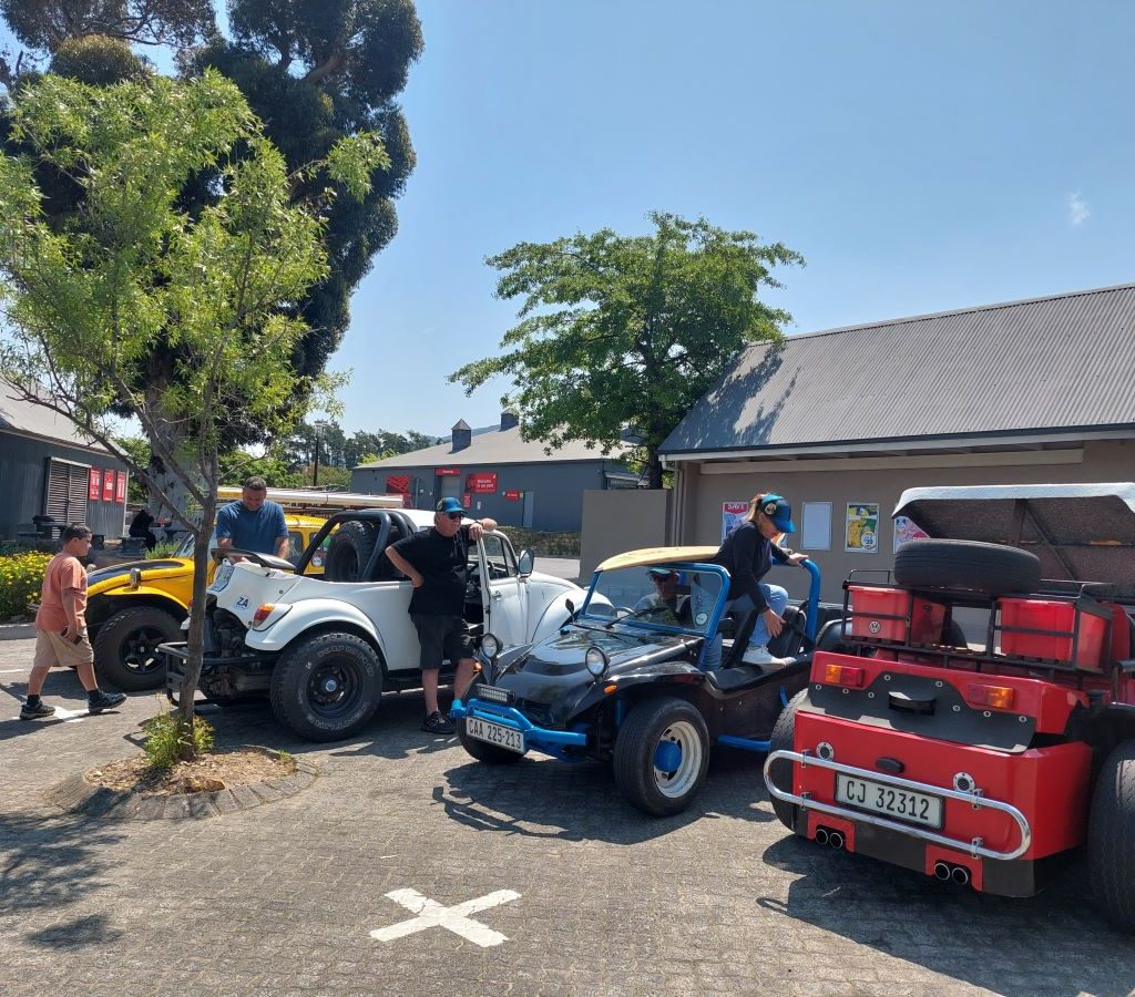 Beach buggies parked at a pit stop during the Wild Buggers Winelands Breakfast Run.
