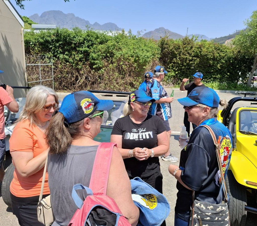 Wild Buggers ladies chatting and giggling during the Winelands Breakfast Run.