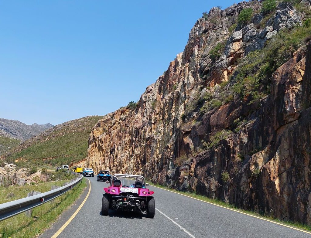 Beach buggies driving through the winding mountain roads during the Wild Buggers Winelands Breakfast Run.