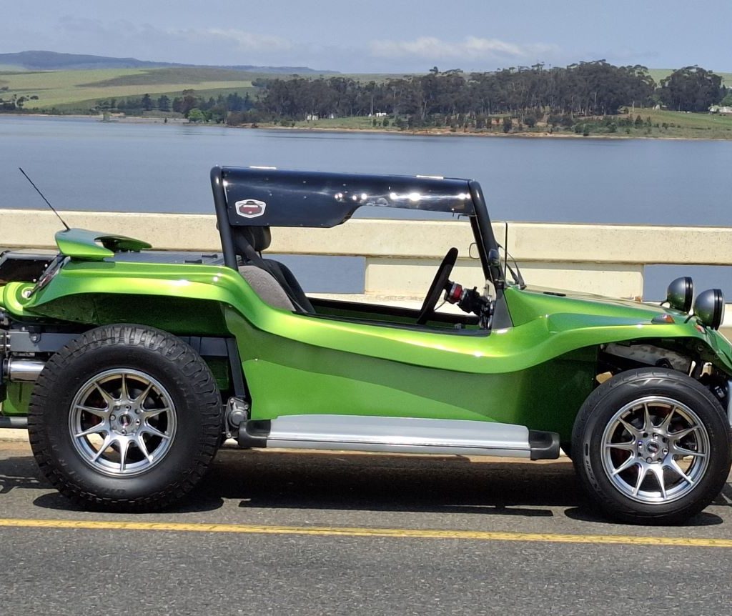 Willie’s green Beamish beach buggy, Hulkie, with a 1400 Nissan motor, parked by the dam during the Wild Buggers Winelands Breakfast Run.