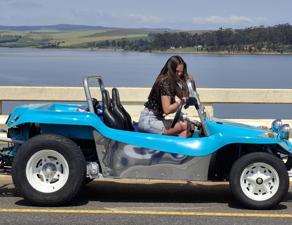 Merinda Theart’s light blue Beamish beach buggy, 60/60, with a 1600 VW air-cooled motor, parked by the dam during the Wild Buggers Winelands Breakfast Run.