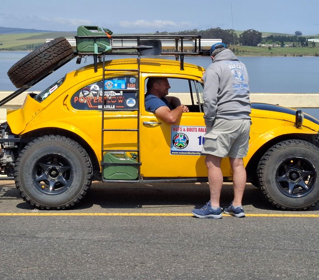 Mielie Pit, the yellow Baja Bug, with the dam in the background during the Wild Buggers Winelands Breakfast Run.