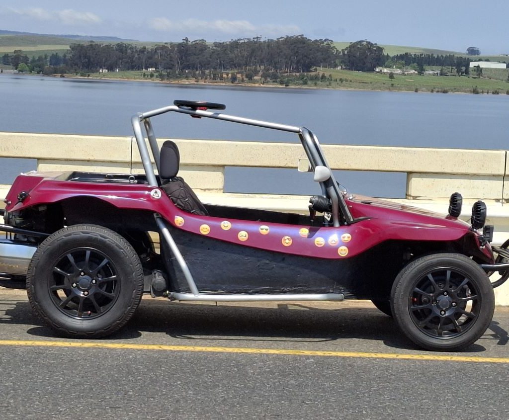 Gary Fleming's Beamish Bug, Emoji, with the dam in the background during the Wild Buggers Winelands Breakfast Run.