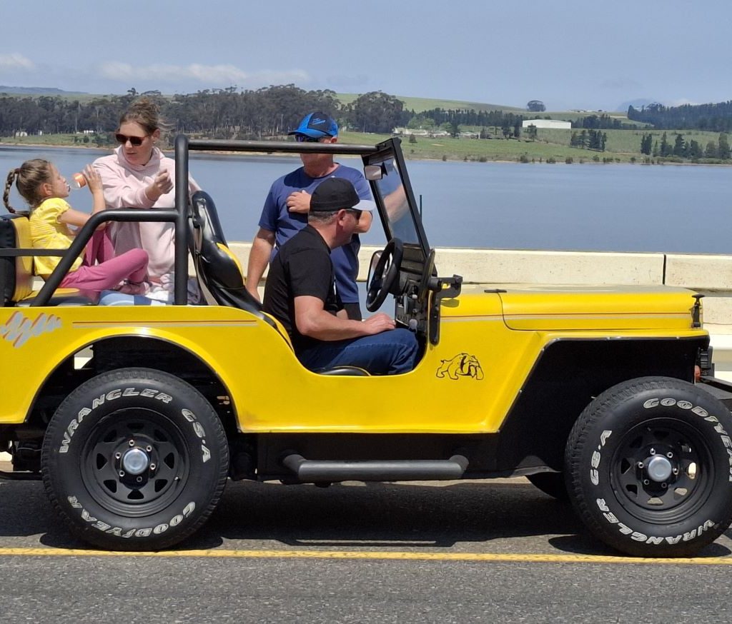 Cobus sitting in his Veep with the dam in the background during the Wild Buggers Winelands Breakfast Run.