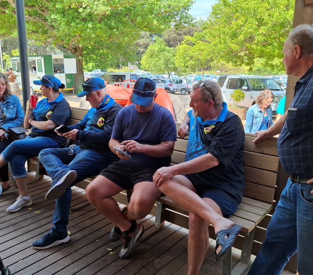 Wild Buggers members chatting at Peregrine Farm Stall in Grabouw during the Winelands Breakfast Run.