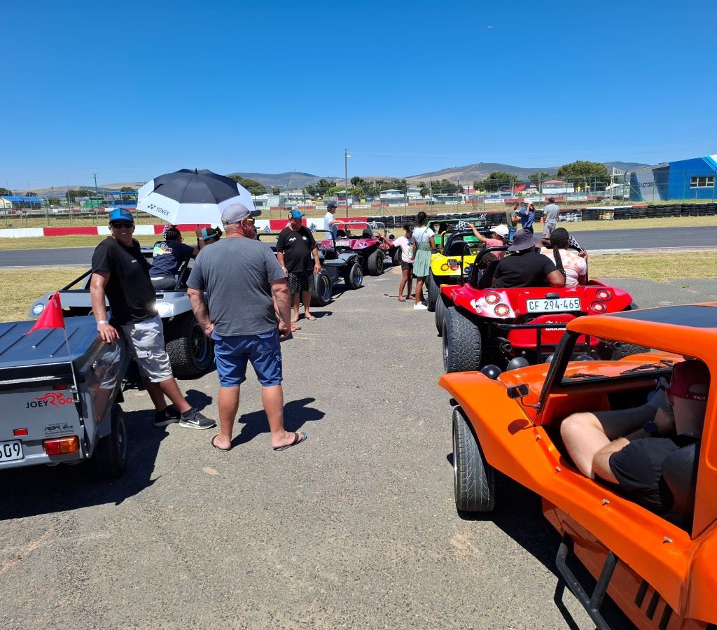 Kids on beach buggies, ready for Killarney charity run.