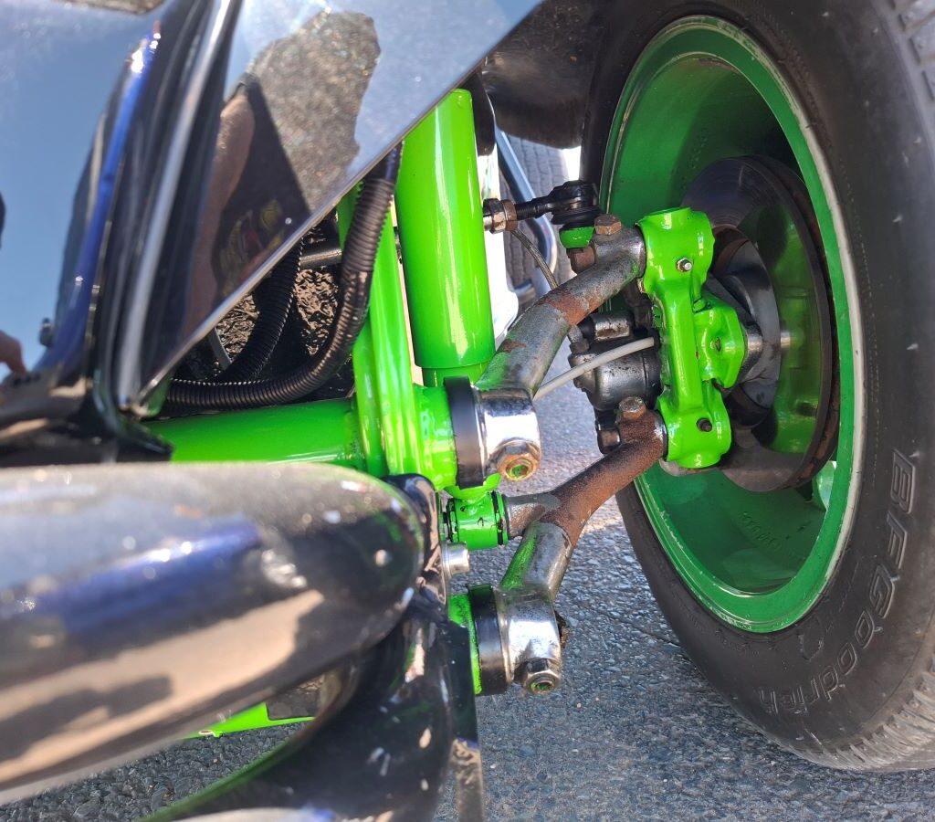 Side profile of a black Beamish beach buggy, showcasing its design and features, at the Wild Buggers Beach Buggy Club's charity run at Killarney International Raceway.