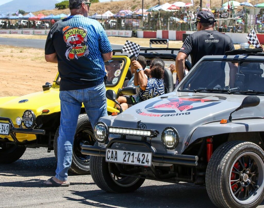 Row of Wild Buggers beach buggies lined up at Killarney International Raceway, ready for the charity run track drive.