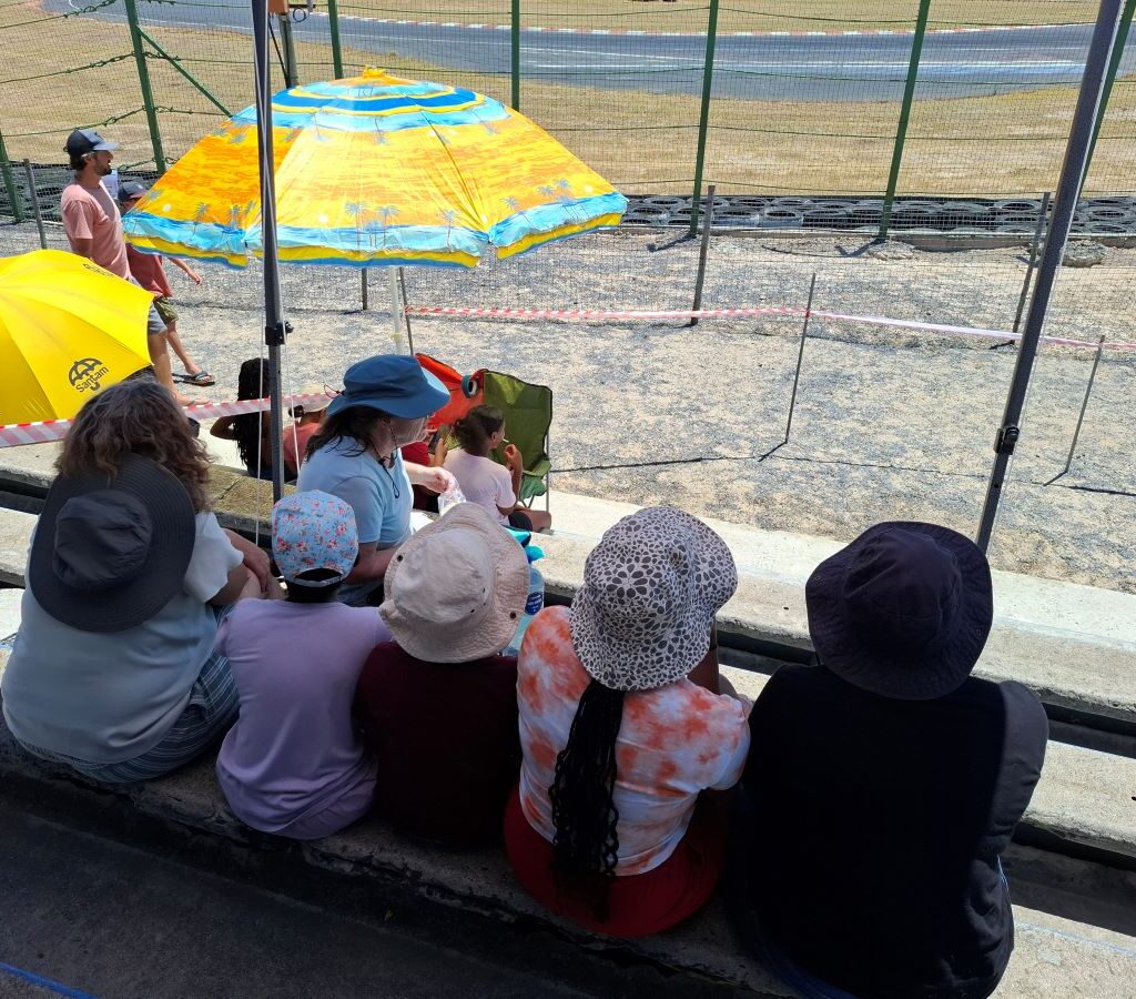 Children from House of Love and Mercy Aids orphanage arrive at Killarney International Raceway for the Wild Buggers Beach Buggy Club's charity run.