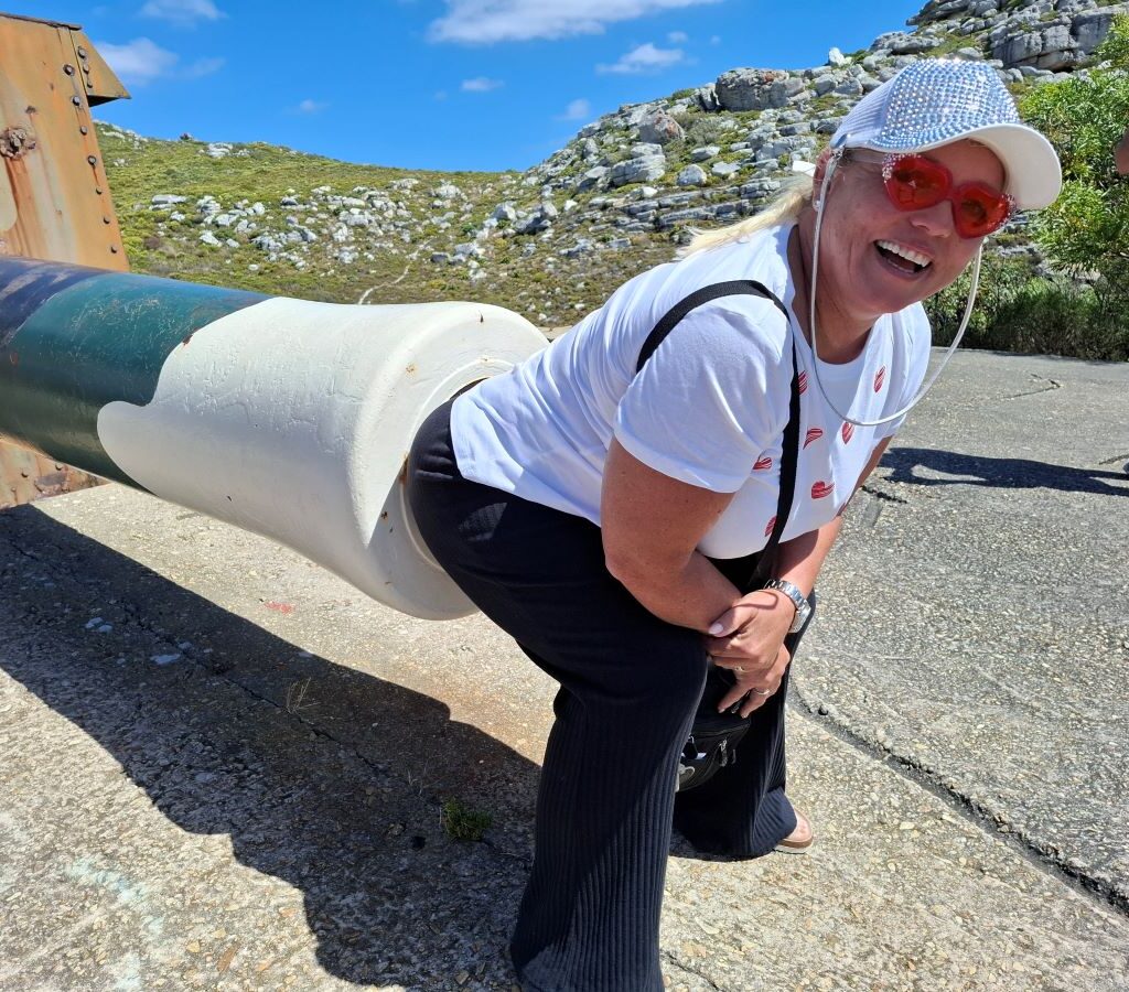 Michelle Jenkins playfully pondering the acoustics inside The Cannon's barrel in Simonstown during the Wild Buggers Beach Buggy Club's Valentine's Day run. (No actual farts were harmed in the making of this photo.)