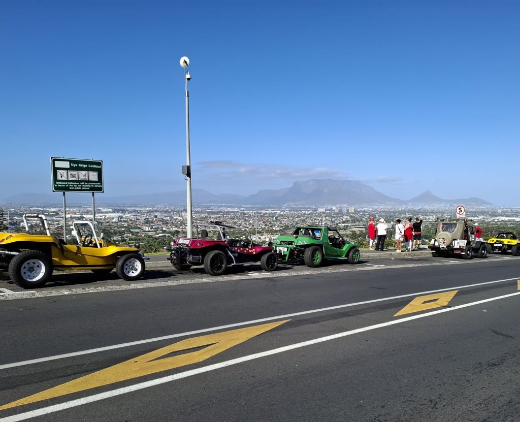 More Wild Buggers Valentine's Run fun at the meeting point! Anton Kleyn's "Shrek" (green Kango), Garry Fleming's "Emoji" (pink Beamish), Wiehann's yellow Beamish, Faizal's Jeep, Anthony Jenkins' "Bumblebee" (yellow Salamander), and Brent Van Der Weijde's orange Salamander. All powered by air-cooled VW magic (mostly).