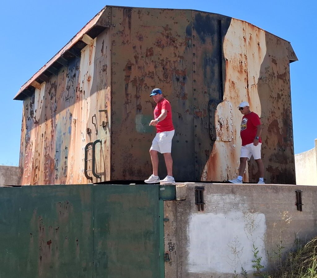 Brent and Faizal standing at the back of The Cannon in Simonstown during the Wild Buggers Beach Buggy Club's Valentine's Day run.