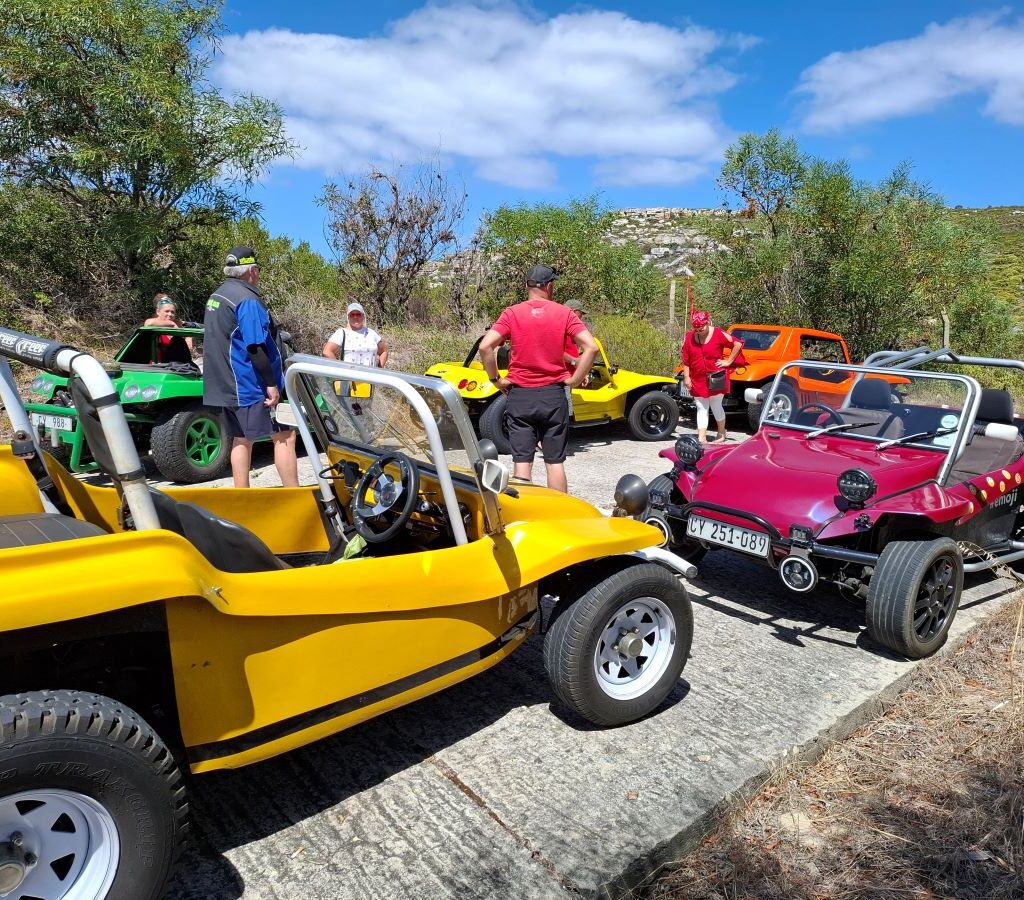 Wild Buggers Beach Buggy Club members back at their classic VWs, ready to continue their Valentine's Day run. Beach buggies lined up and ready for the road.