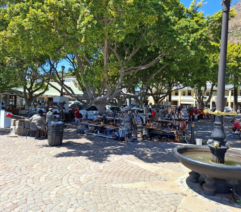 Stalls, cannons, and beautiful trees at Just Nuisance in Simon's Town, a stop on the Wild Buggers Beach Buggy Club's Valentine's Day run. Classic VWs likely parked