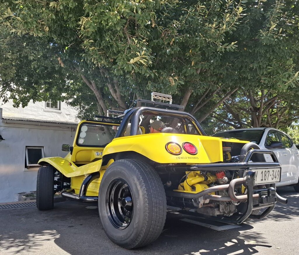 Anthony and Michelle Jenkins' yellow Salamander beach buggy, "Bumblebee," parked at an ice cream stop during the Wild Buggers Beach Buggy Club's Valentine's Day run.