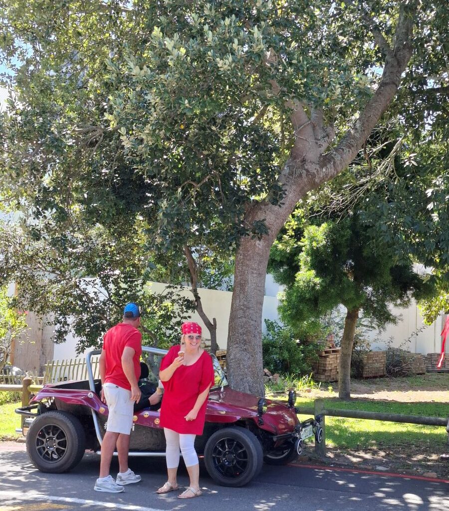 Brent and Sam Van Der Weijde chatting with Gary, who is sitting in his beach buggy, during the Wild Buggers Beach Buggy Club's Valentine's Day run at an ice cream stop.