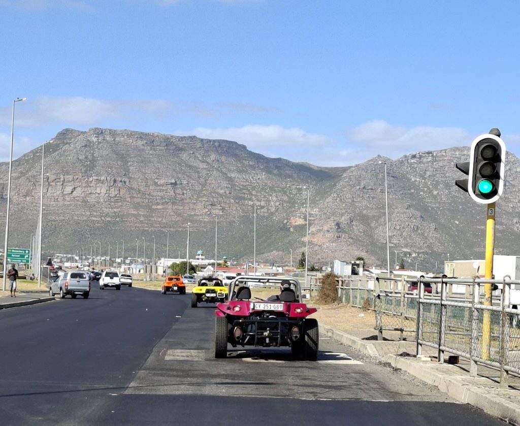 The Wild Buggers Beach Buggy Club members drive off on their Valentine's Day run from Lovers Lane in Plattekloof. Classic VWs in motion!
