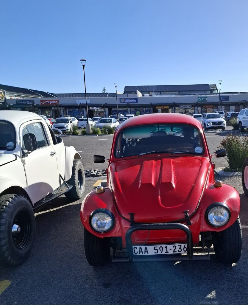 James Taylor’s bold red Baja Bug at the Cape Buggy Tour 2025, styled with old school VW flair.