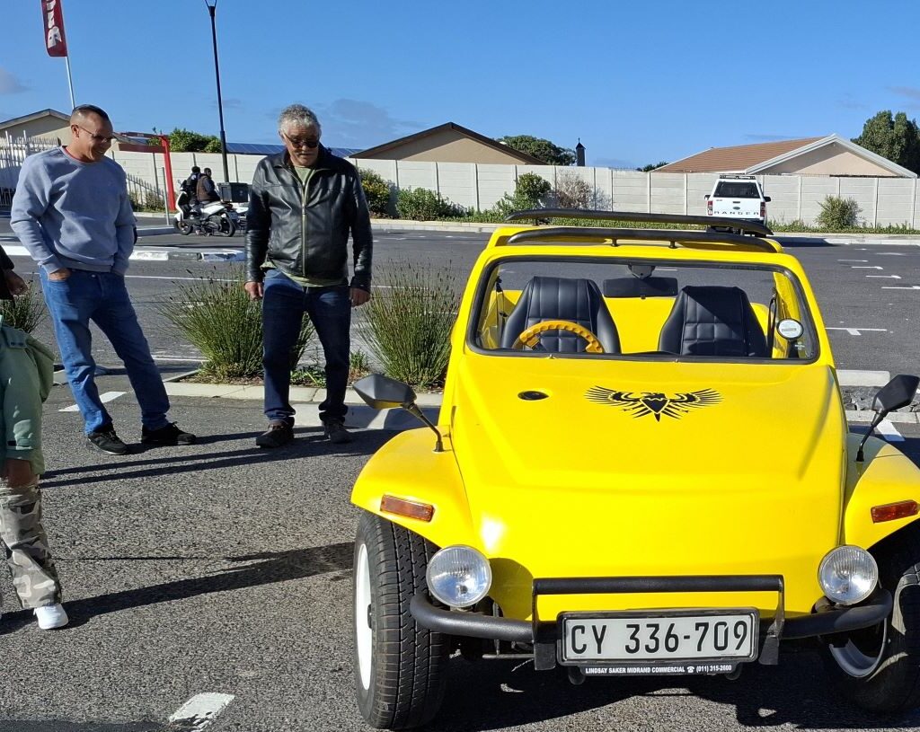 Bright yellow Kango Beach Buggy cruising the Cape coastline during the Cape Buggy Tour 2025.