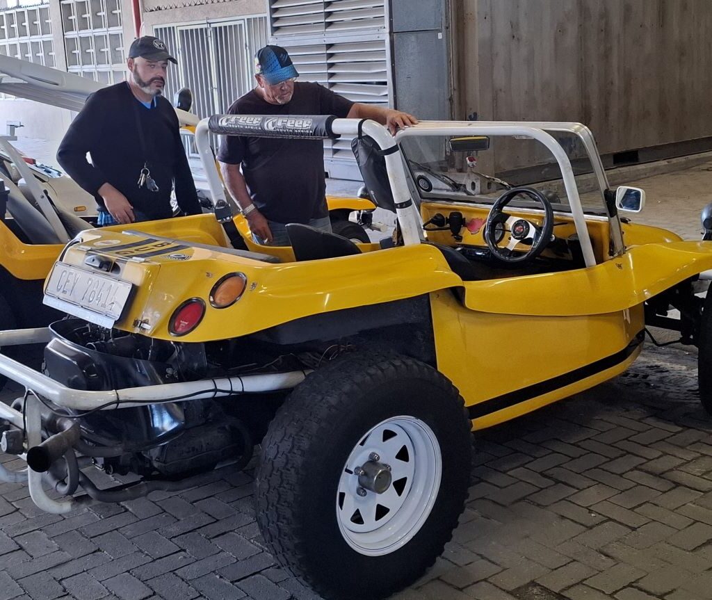 Wiehann and Anthony catching up at a pitstop during the Cape Buggy Tour 2025, sharing stories and enjoying some downtime.