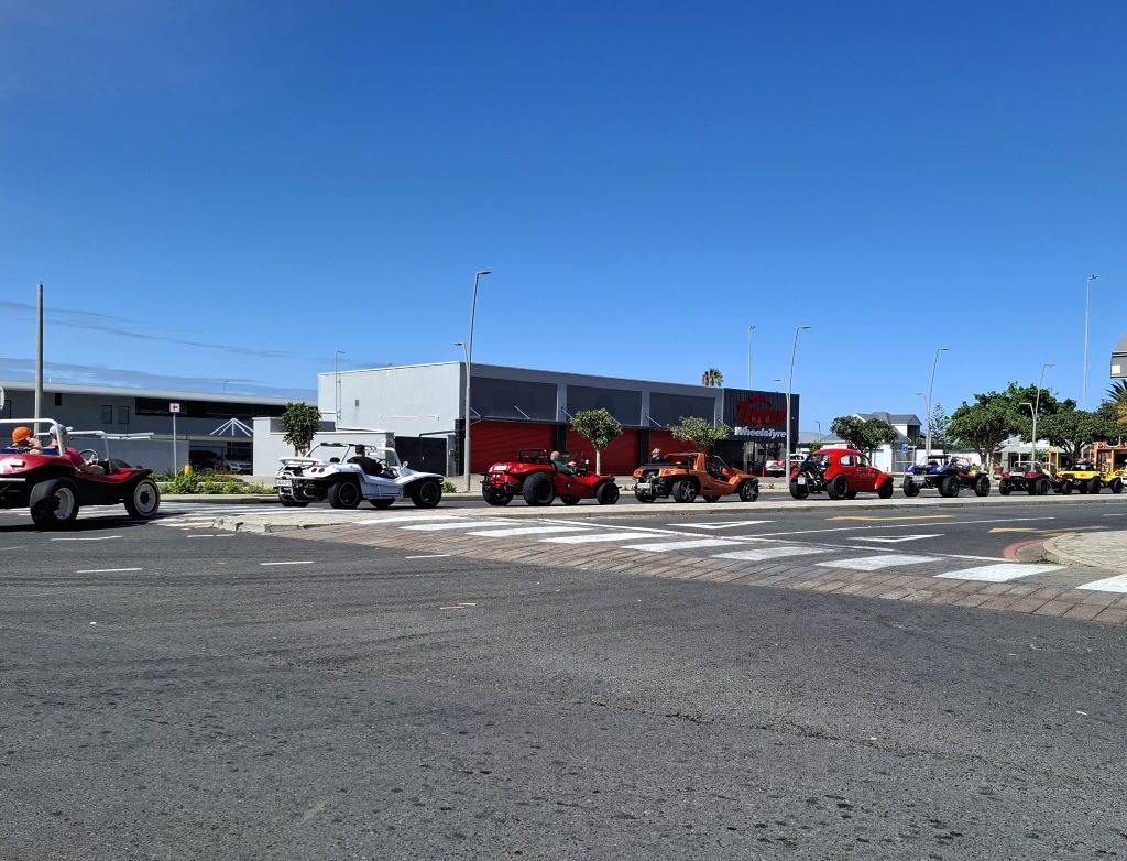 Beach buggies cruising along the coastline during the Cape Buggy Tour 2025.