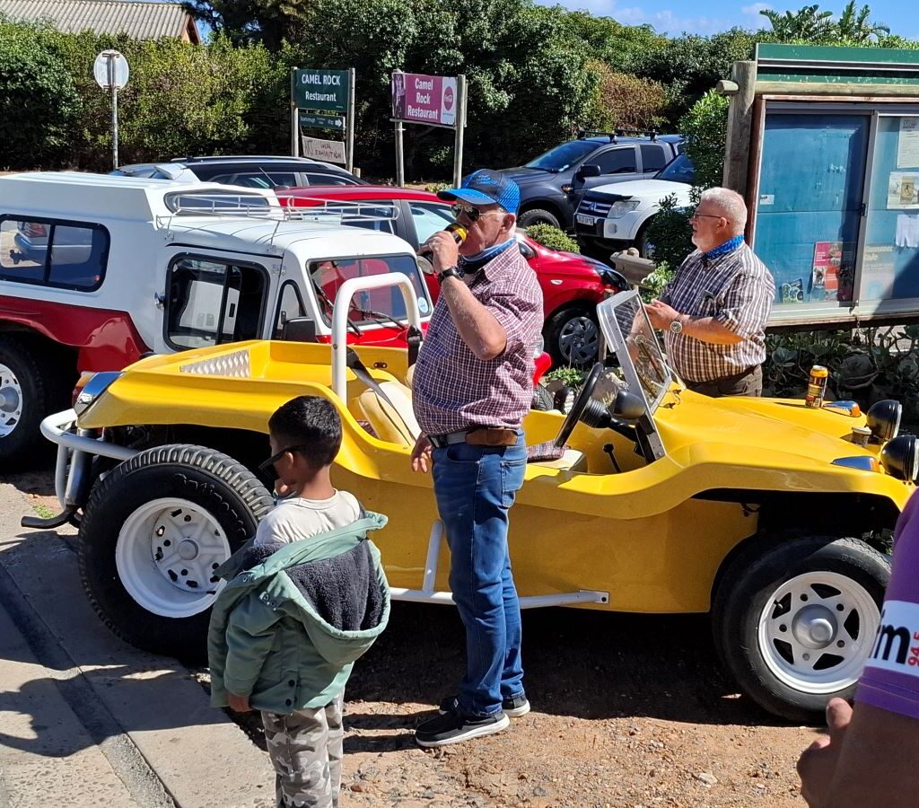 Beach buggy drivers relaxing and enjoying a pitstop during the Cape Buggy Tour 2025.