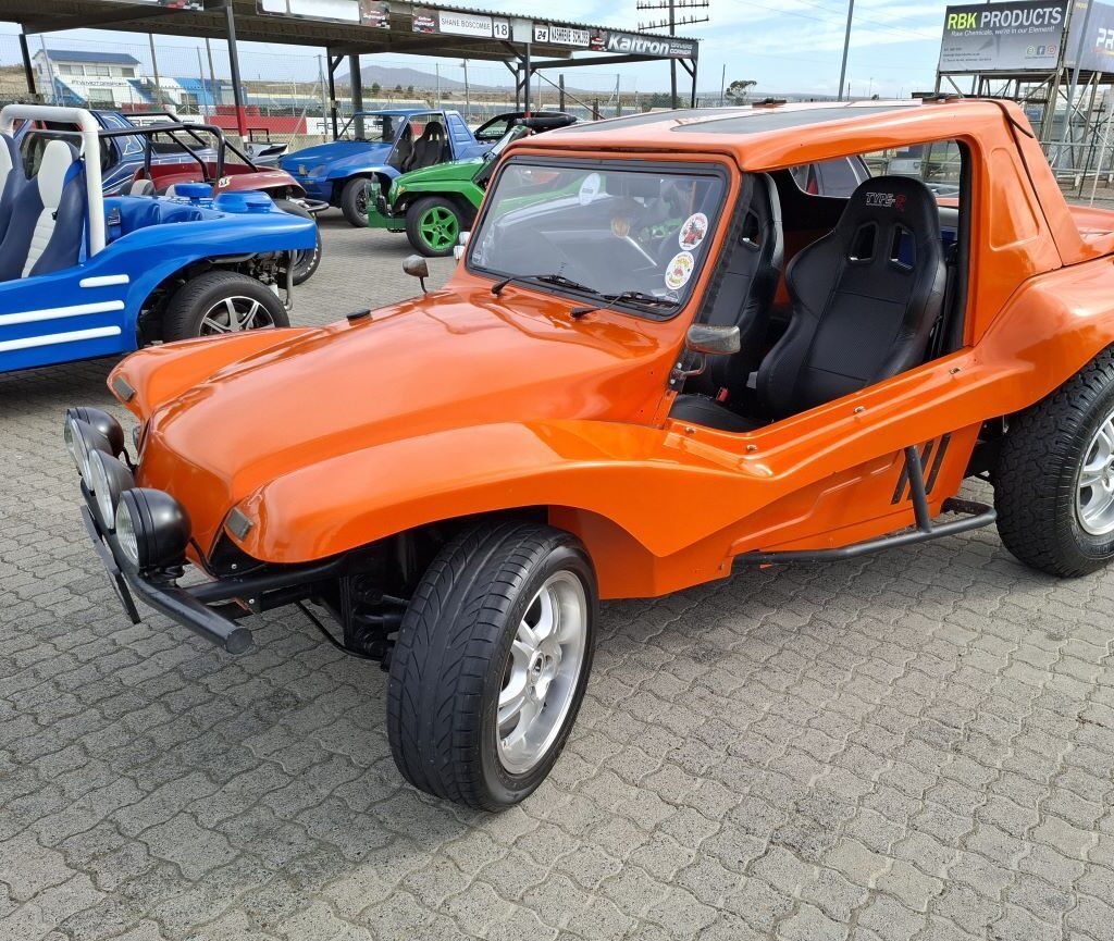 Brent Van Der Weijde's bright orange Salamander beach buggy, now known as "The Wasp" (formerly "Mango"), at the Wild Buggers Reach for a Dream charity run.