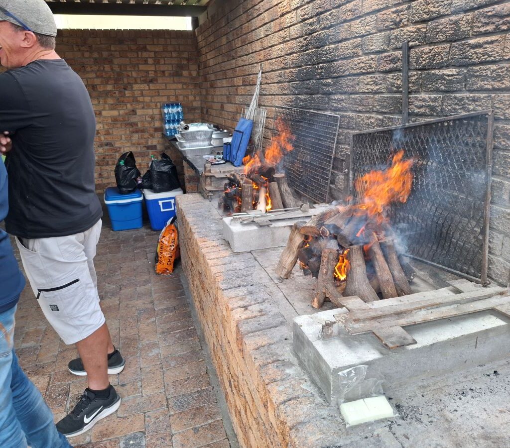 Braai fires are lit at the Killarney International Raceway clubhouse, ready for the Wild Buggers to start grilling food for the Reach for a Dream children.