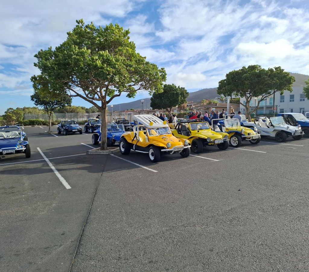A growing line-up of beach buggies at Spar Plattekloof as more Wild Buggers members arrive for the Reach for a Dream charity run, totaling 34 vehicles.