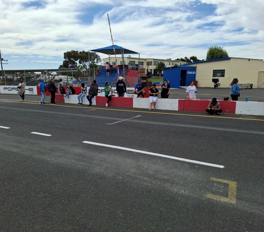Spectators waiting on the side to see us come past with the kids