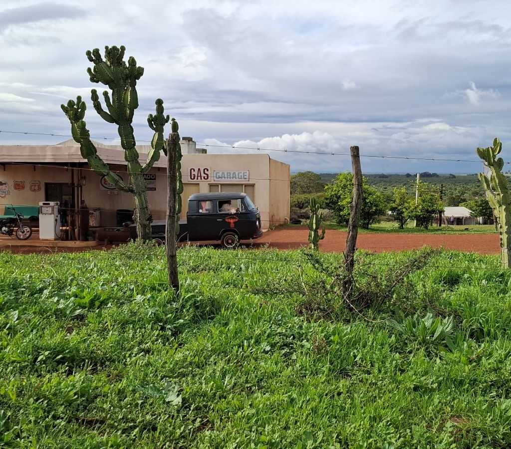 Tony's VW air-cooled Kombi parked at the secret old-school gas station in Philadelphia, a popular spot for international movie makers, during The Wild Buggers' Tony & Sue's Run.