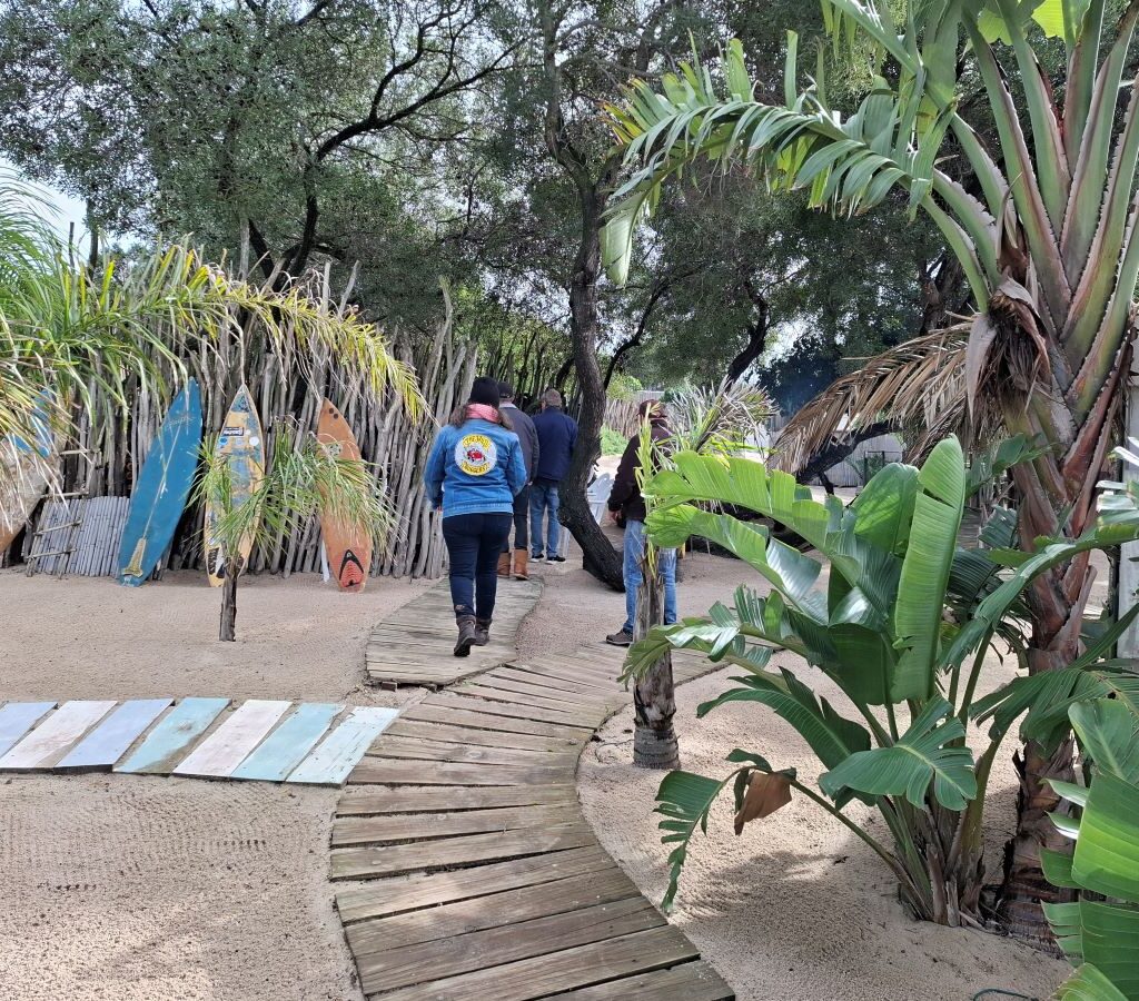 A scenic view of the "Mauritius" destination, with Mickey walking ahead on the path, during The Wild Buggers' Tony & Sue's Run.