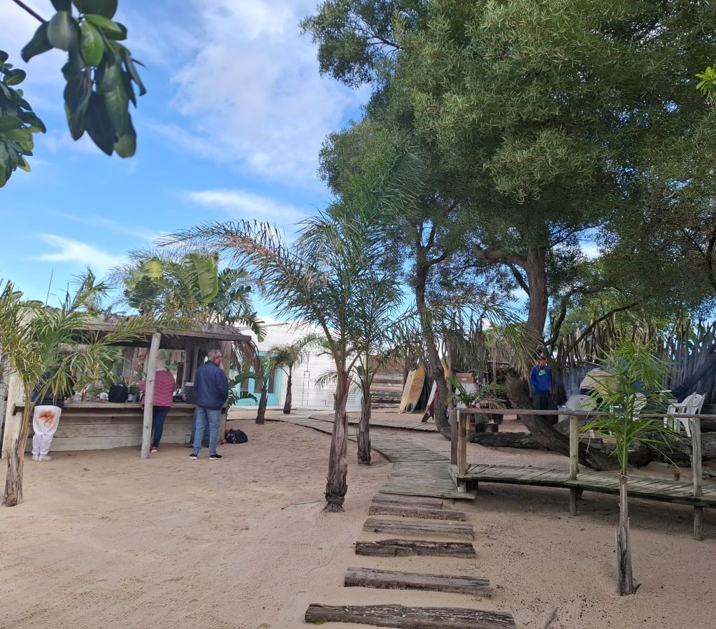 A panoramic view of the "beach cocktail bar" with the braai area visible in the distance, at the "Mauritius" destination during The Wild Buggers' Tony & Sue's Run.