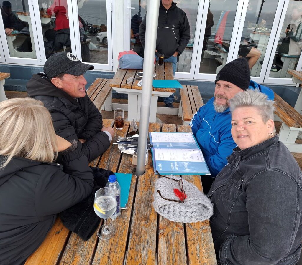 Wild Buggers club members chatting and socializing at Dixies Restaurant after 'Revving Up for the Lens' cruise
