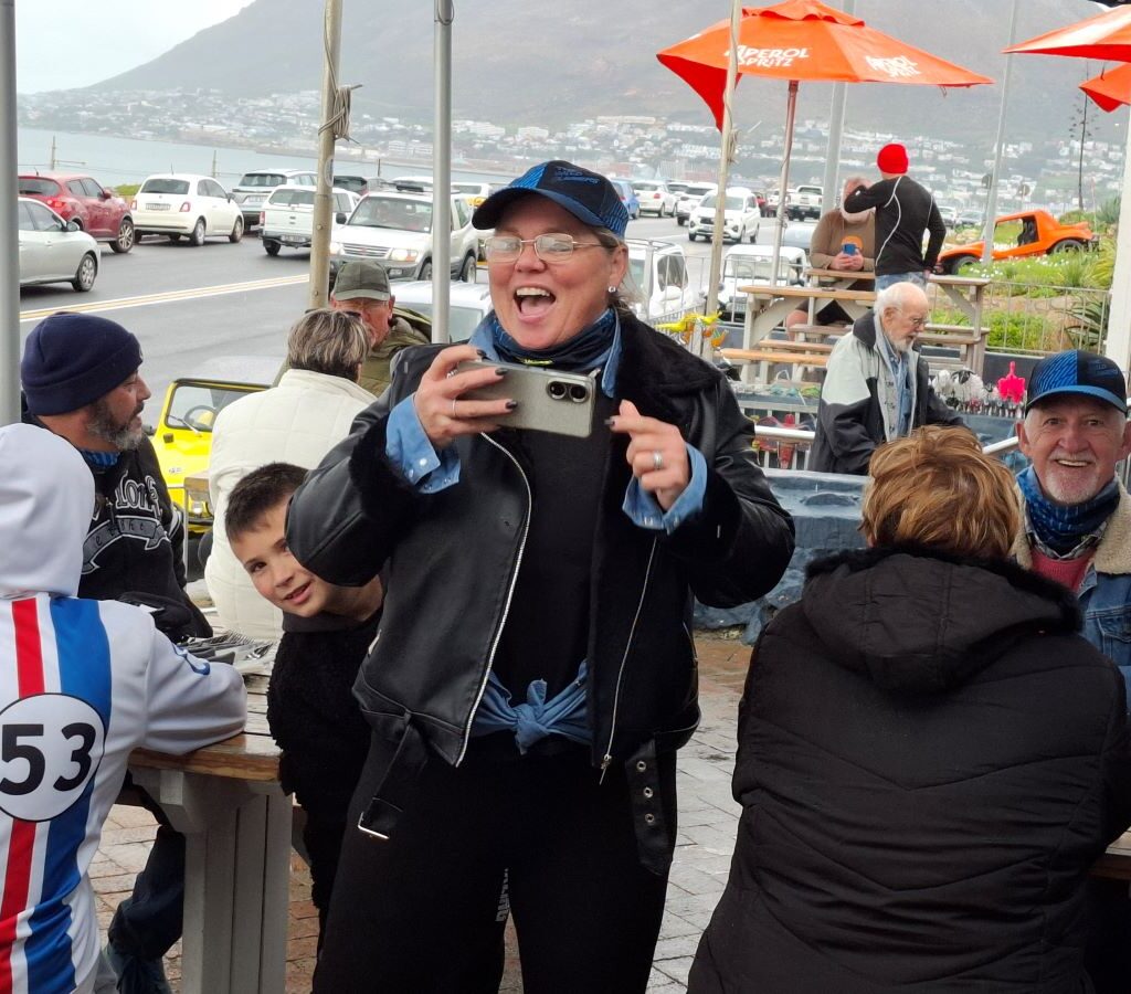 Michelle taking photos and greeting members at Dixies Restaurant during Wild Buggers 'Revving Up for the Lens' event