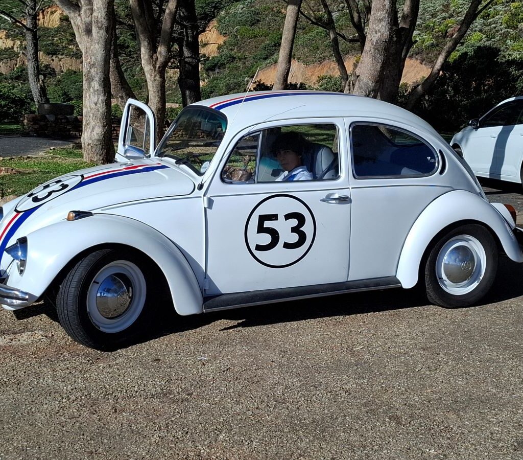 Stunning VW Air-Cooled Beetle, Herbie 53 look-alike, with owner wearing Herbie 53 jacket
