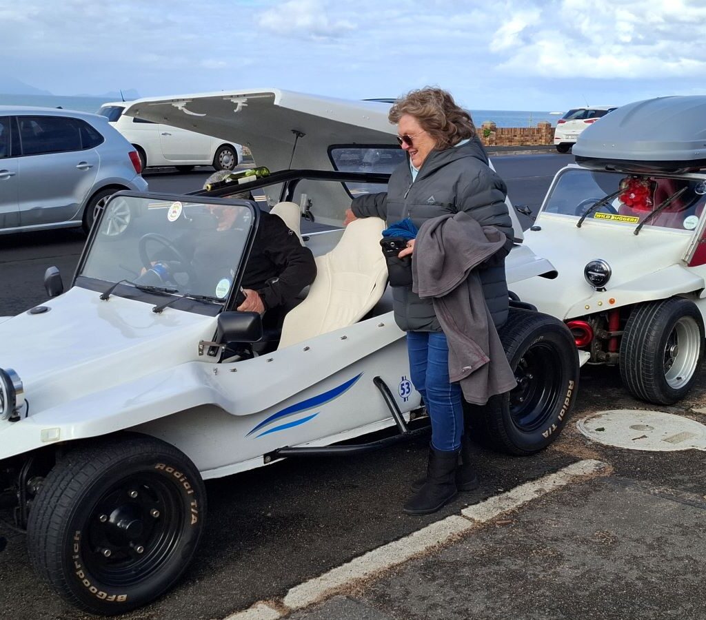 Nick and Ellie getting into their beach buggy in Cape Town, Western Cape