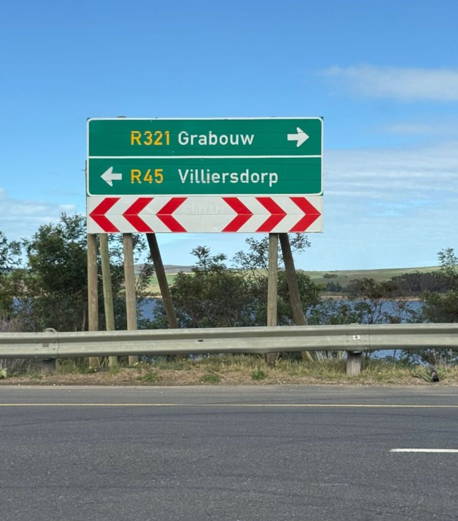 A photo of a road sign showing directions to Grabouw and Villiersdorp, taken at a crossroads during a Wild Buggers club run.
