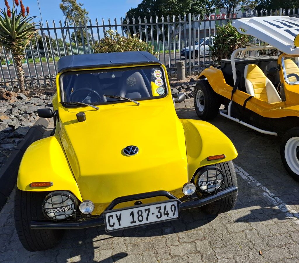 A bright yellow VW air-cooled Salamander beach buggy, owned by Anthony and named BumbleBee, is pictured at a Wild Buggers club event.